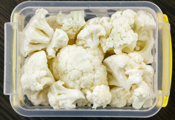 Top view vegetables cauliflower plastic case