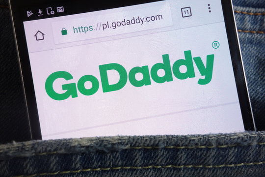 KONSKIE, POLAND - JUNE 02, 2018: GoDaddy website displayed on smartphone hidden in jeans pocket