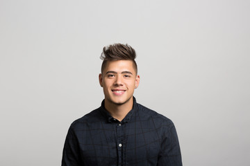 Obraz premium studio portrait of a happy young man 