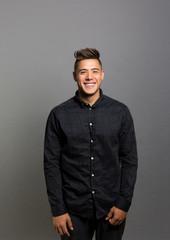 Obraz premium studio portrait of an excited young man 