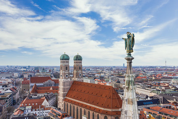 Muenchner Kindl and Frauenkirche in Munich
