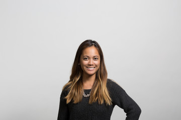 Obraz premium studio portrait of a happy young woman