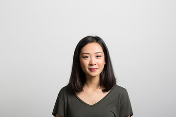 Fototapeta premium Studio portrait of a thoughtful young woman