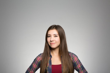 Obraz premium Studio portrait of a confident young woman