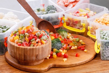 Green food healthy vegetable in plastic box, wooden.