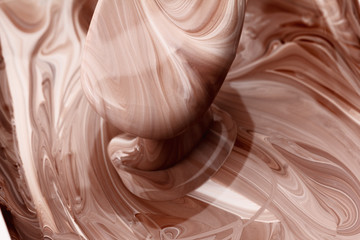 Abstract background, hot, melted chocolate and milk