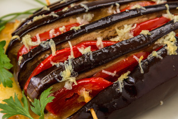 Courgettes stuffed with cheese, tomatoes, bell pepper