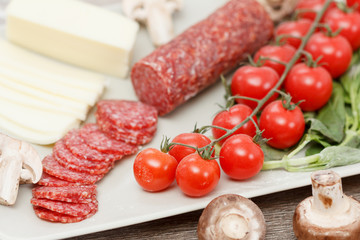 Food ingredients for pizza on table