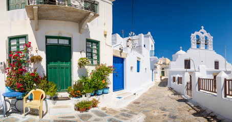 Fototapeta na wymiar Panoramic view of colorful mediterranean street, Amorgos island, Greece