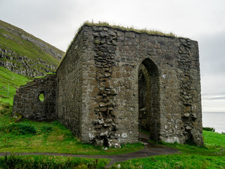 Faroe Islands. Kirkjub&oslash;ur village. Old never roofed ruins of medieval cathedral.