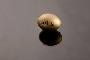 Gold nest eggs and coins concept for retirement, savings, and financial planning