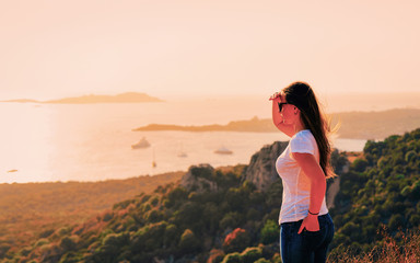 Sunrise or sunset and young lady at Porto Rotondo reflex