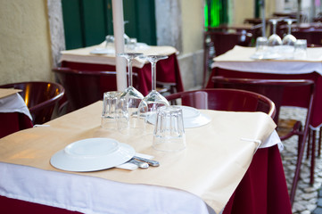 Outdoor restaurant table ready for guests