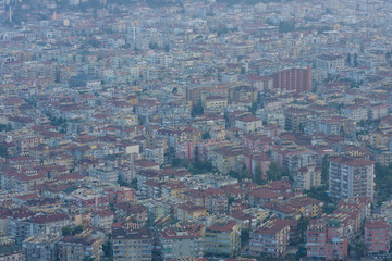 Obraz premium Alanya. Turkey. View of the residential neighborhoods popular resort town on the Anatolian coast. Dusk. Bird's-eye view.