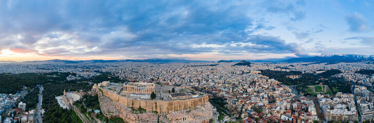 Aerial view of Acropolis of Athens, the Temple of Athena Nike, Parthenon, Hekatompedon Temple, Sanctuary of Zeus Polieus, Odeon of Herodes Atticus, Erechtheion at sunset