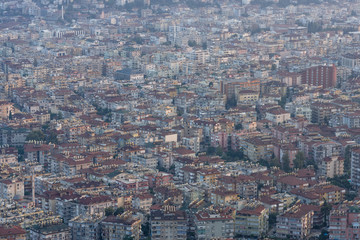 Alanya. Turkey. View of the residential neighborhoods popular resort town on the Anatolian coast. Dusk. Bird's-eye view.