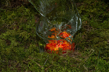 Falling egg in a glass of water for Easter
