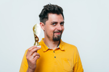 man with a golden cup