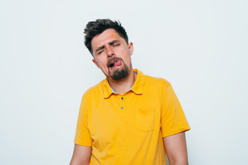 Obraz premium Man shows tongue