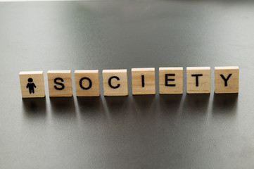 Wooden blocks with letters. Society. Concept.  