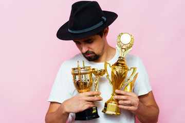 man with a golden cup