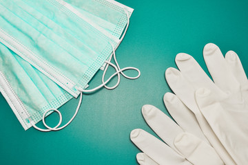 Medical masks and sterile gloves. Coronavirus protection concept. One of the ways to reduce the...