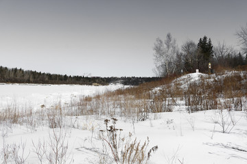 winter landscape with lake and trees