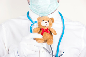 Cute toy in the doctor&rsquo;s hand