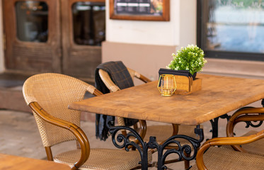Empty rustic restaurant with now people and customers during covid 19 corona virus pandemic shut down.