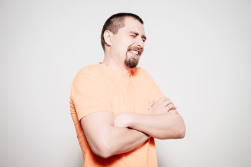 Portrait of a man arms folded