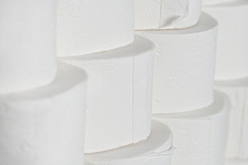 Toilet paper rools stacked on top of each other