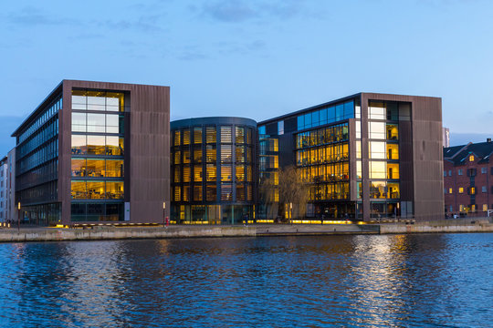 modern buildings on Copenhagen embankment, evening view