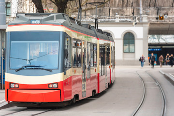 Fototapeta na wymiar Tram in Zurich city. Electric public transport in Switzerland