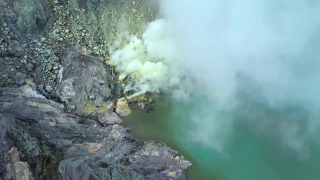Aerial view of sulfur mine at the crater of Kawah Ijen volcano. East Java, Indonesia.