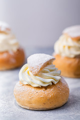 Semla - traditional Scandinavian cream and almond paste filled cardamom bun for shrowe tuesday