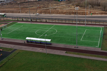 view from a height of a residential quarter of the city with a sports ground