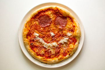 Happy pizza salami and ham (prosciutto cotto)