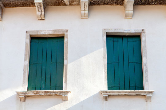 Green shutters in Venice Italy