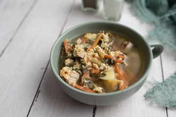 Fresh green sorrel soup, Russian special egg drop soup with vegetables, healthy soup