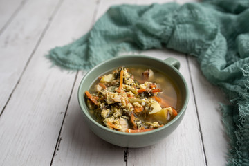 Fresh green sorrel soup, Russian special egg drop soup with vegetables, healthy soup