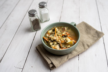 Fresh green sorrel soup, Russian special egg drop soup with vegetables, healthy soup