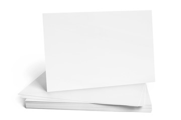 Close-up of blank cards, tickets or flyers, isolated on white