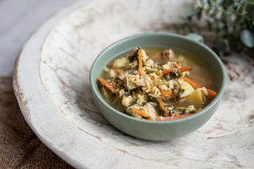 Fresh green sorrel soup, Russian special egg drop soup with vegetables, healthy soup