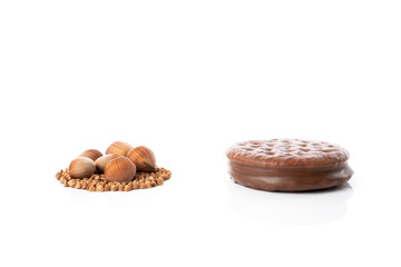 Chocolate cookie and buckwheat and huzelnuts cookie isolated on white background