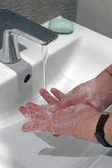 Fototapeta premium Hand washing with soap