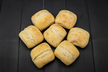 Fresh bread in geometric arrangement, golden and crisp, freshly made
