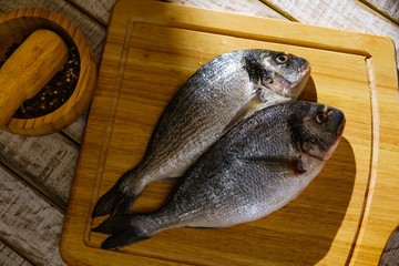 Fish seafood dorado, raw food, nutrition.