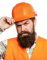 Bearded man worker with beard in building helmet or hard hat. Man builders, industry. Builder in hard hat, foreman or repairman in the helmet. Portrait architect builder, civil engineer working