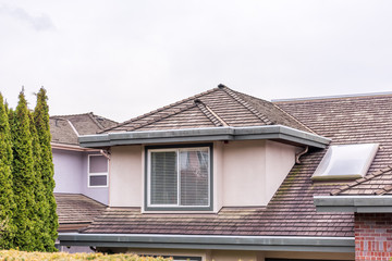 The top of the house with nice window in Vancouver, Canada.