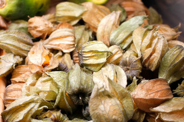 A view of a basket full of gooseberries on display at a local grocery store.